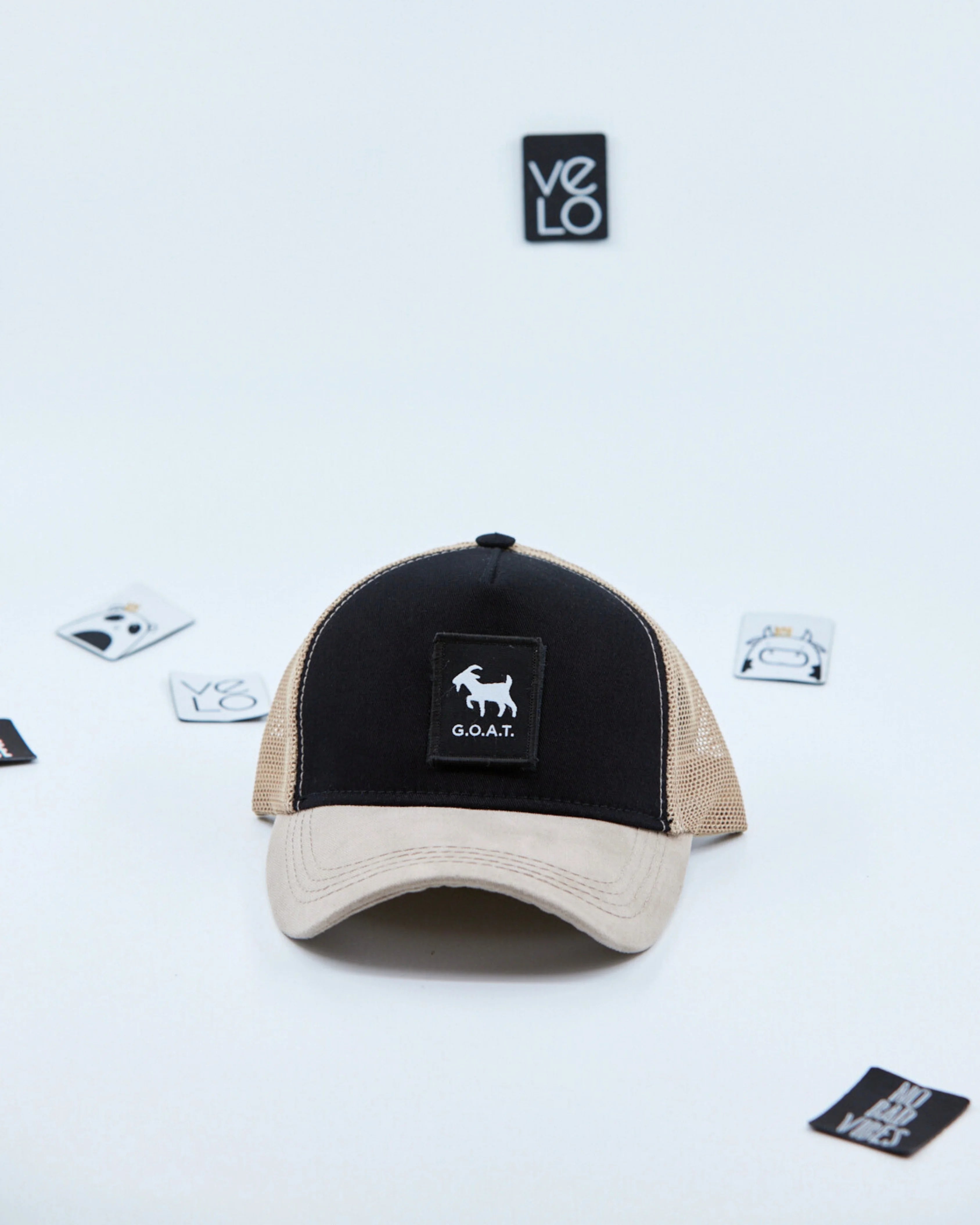 Front view of Black and Beige Trucker Cap