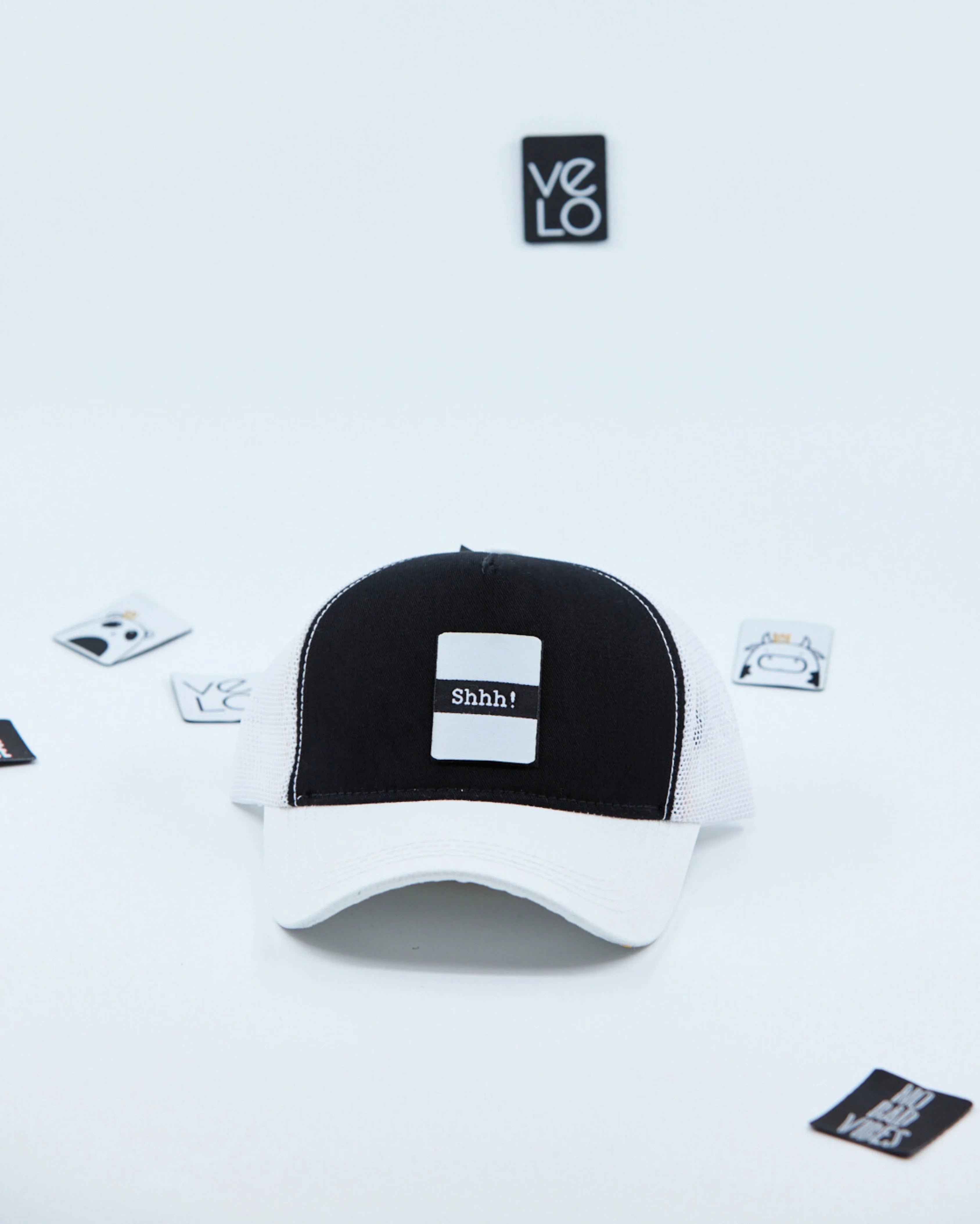 Front view of Black and White Customisable Trucker Cap
