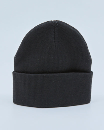 Black beanie on a light blue background