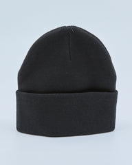 Black beanie on a light blue background