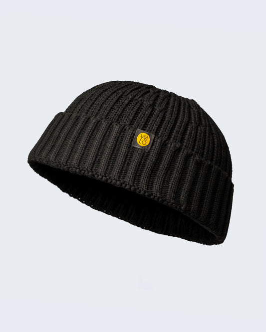 black fisherman beanie on a white background