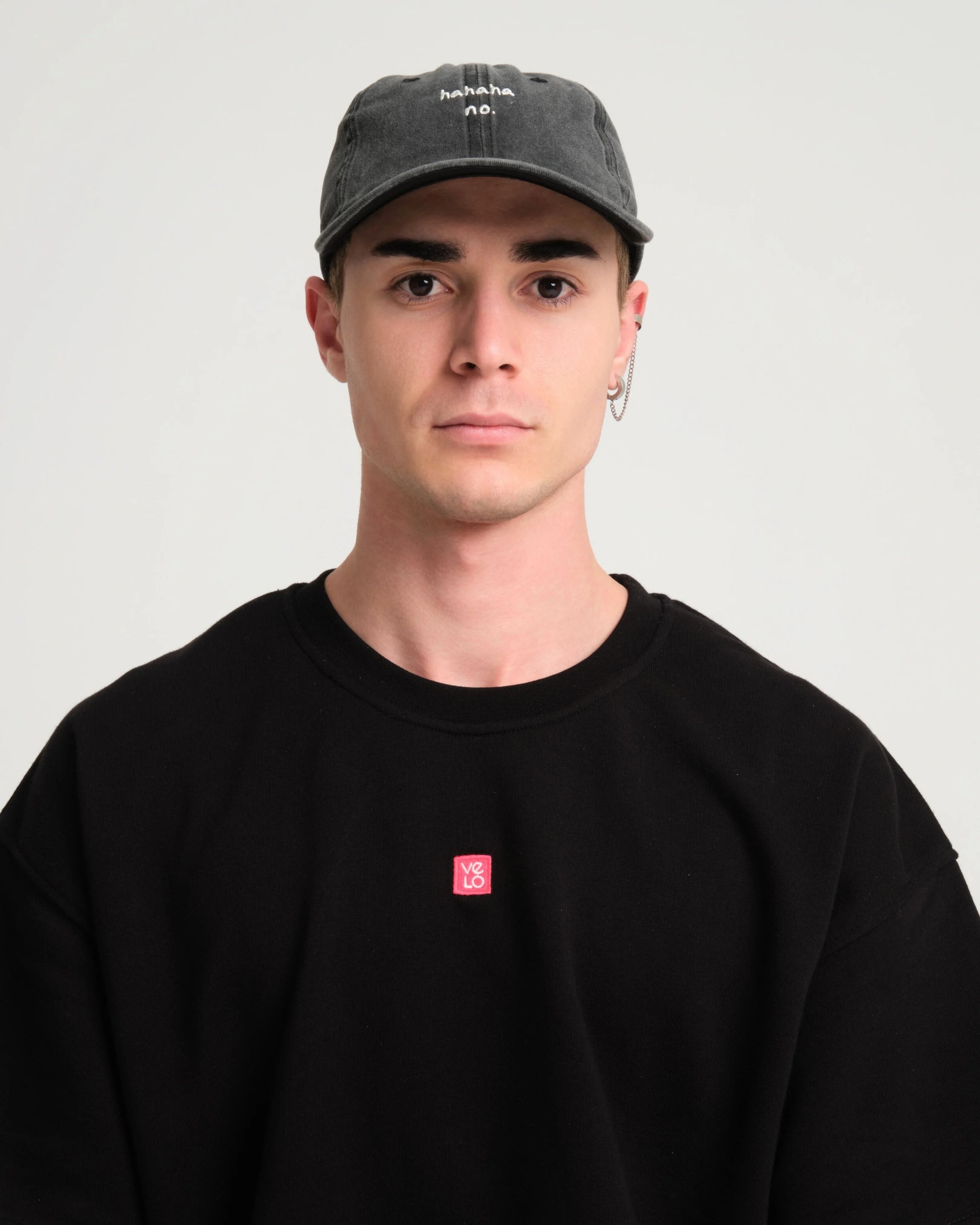 man wearing Hahaha No Black Washed Cap