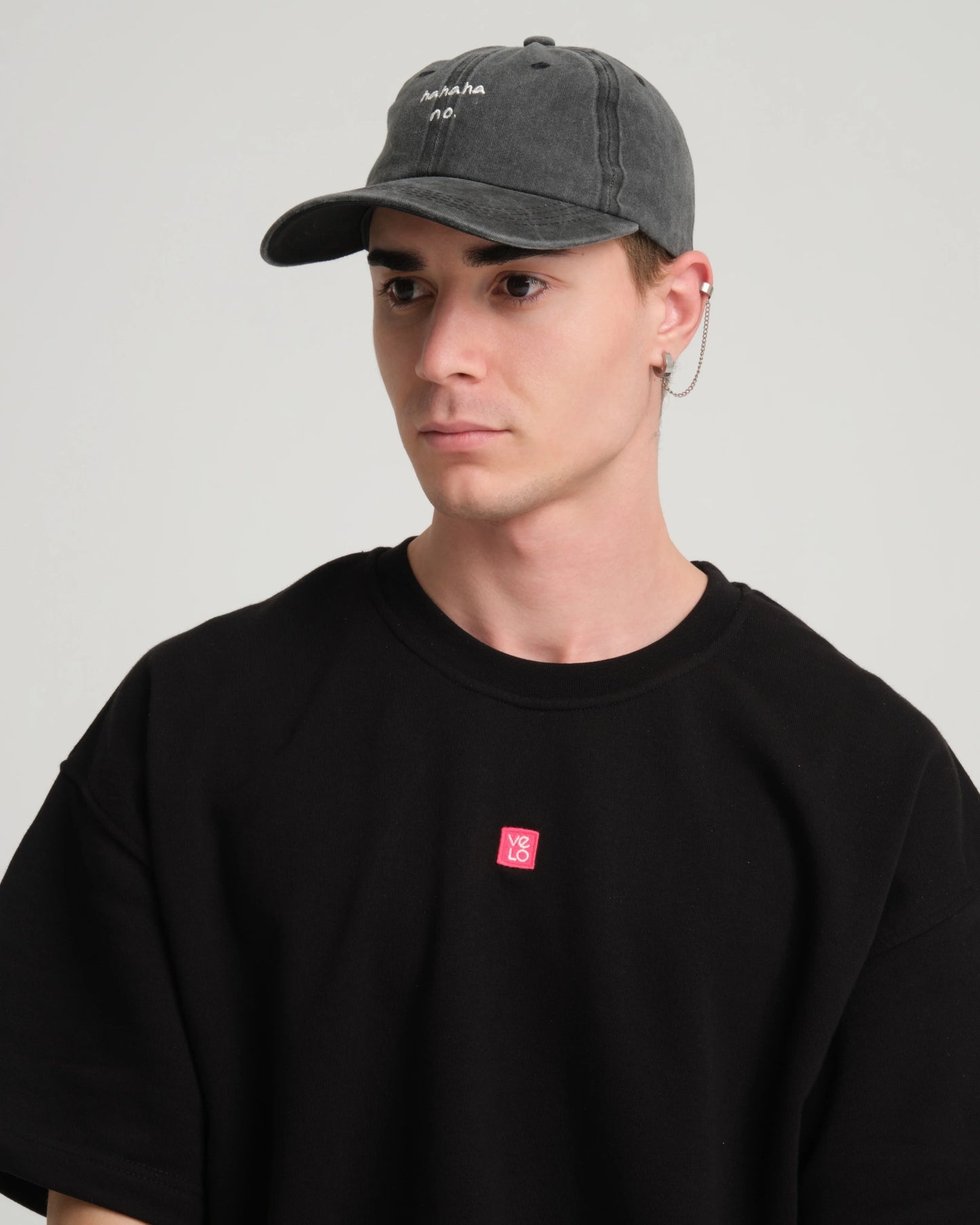 man wearing Hahaha No Black Washed Cap Hat