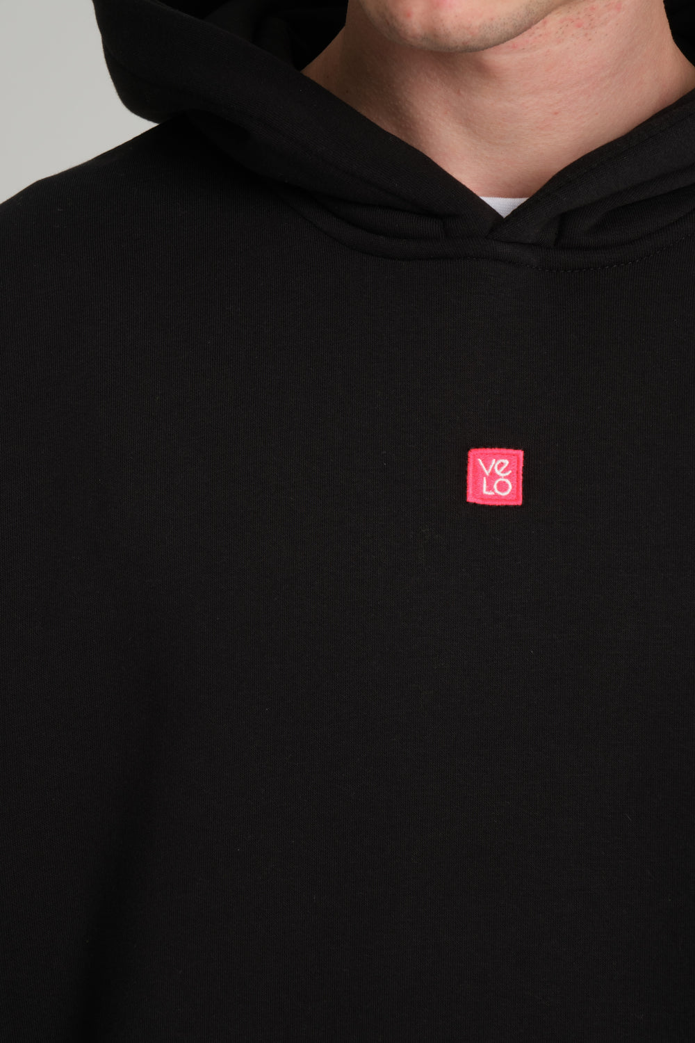 front view of black love pixel hoodie