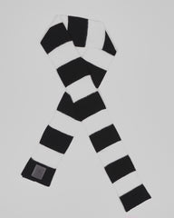 Black & White Lite unisex acrylic scarf flat lay in crisp black and white
