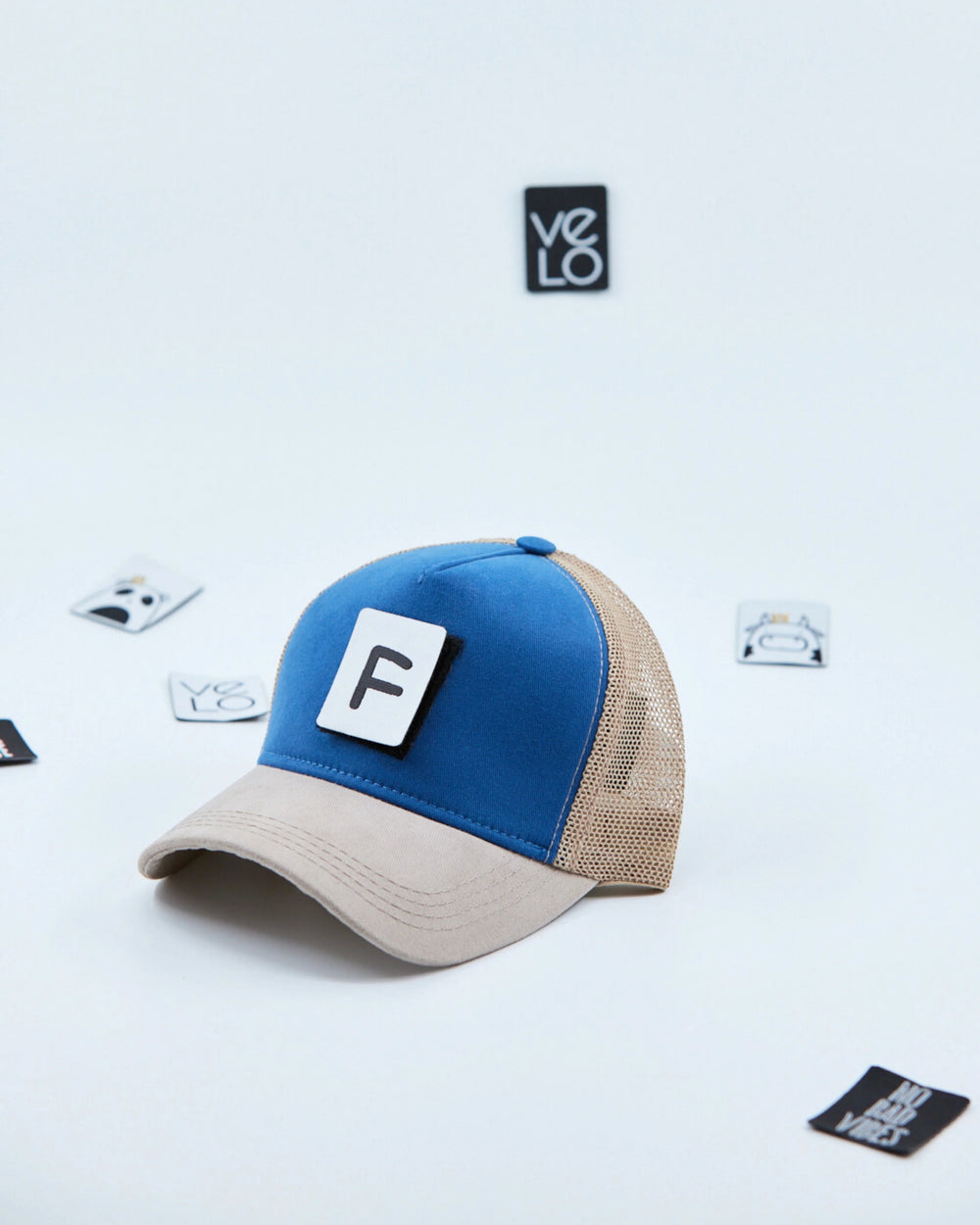 Side view of Blue and Beige Customisable Trucker Cap