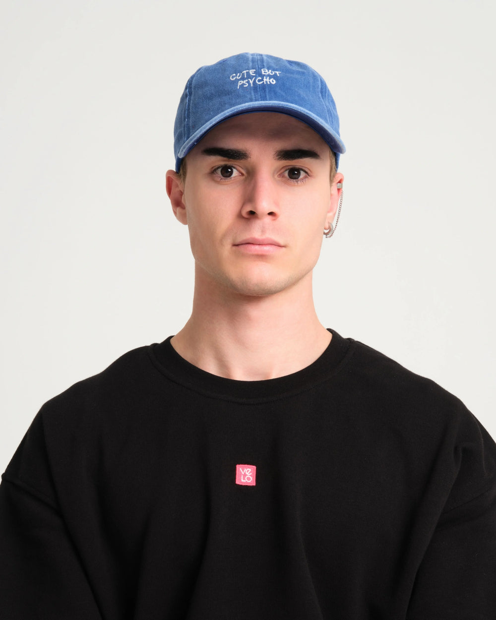 man wearing Cute But Psycho Blue Washed Cap Hat