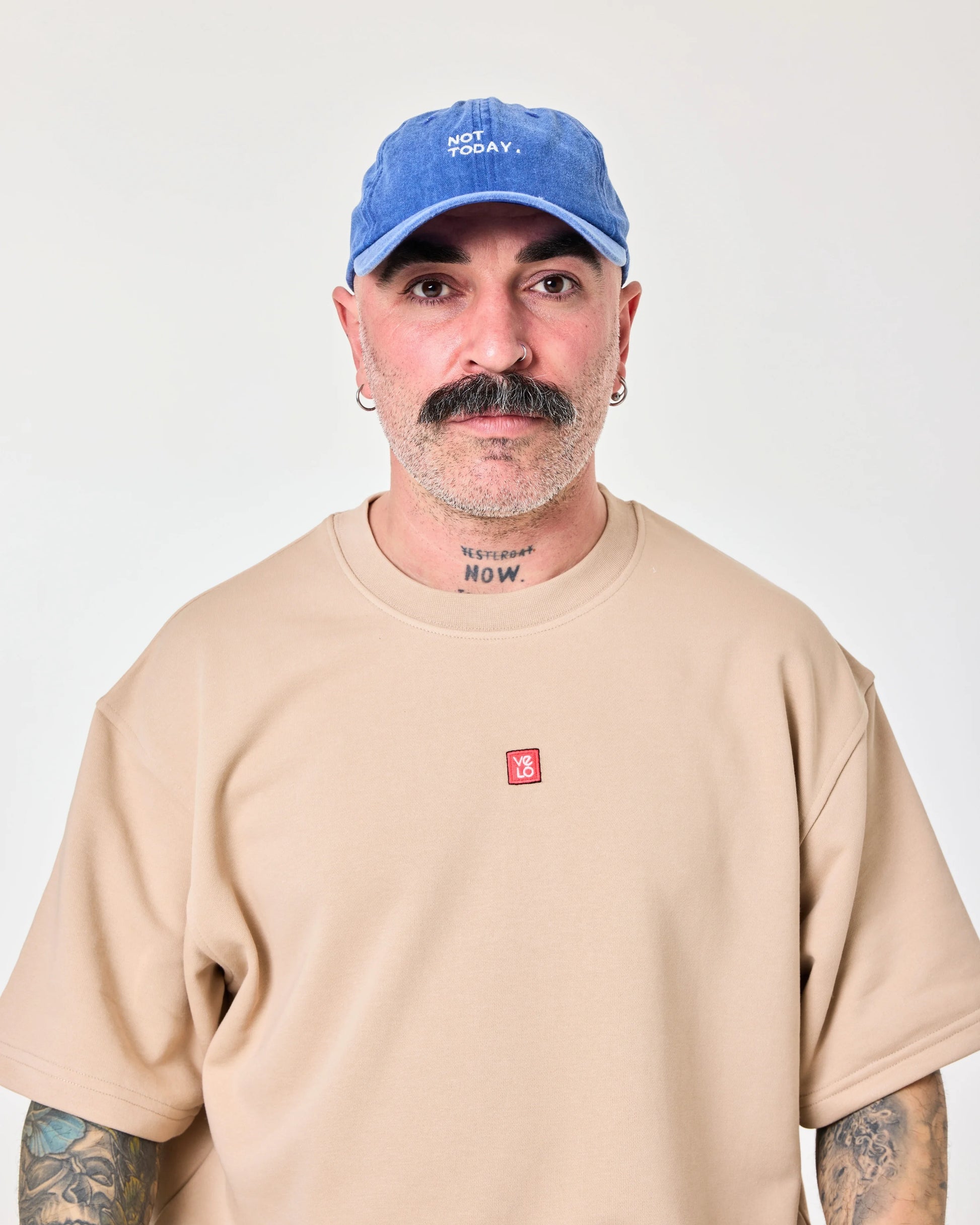 man wearing Blue Washed Cap with Not Today embroidered in white