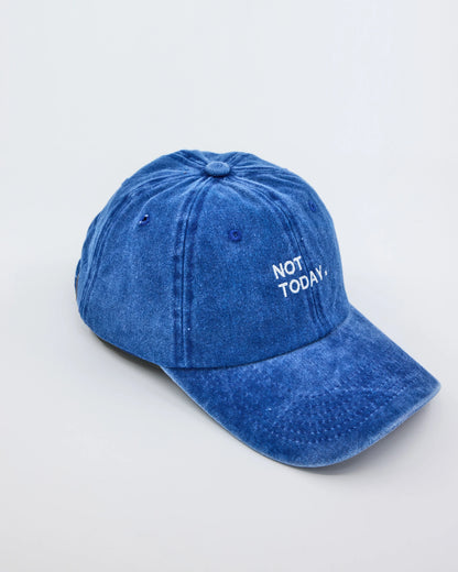 side view of Blue Washed Cap with Not Today embroidered in white