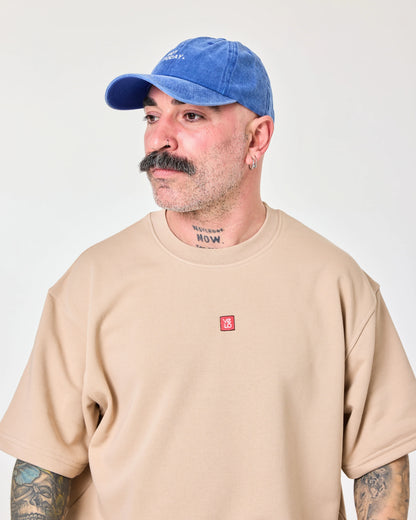 man wearing Blue Washed Cap with Not Today embroidered in white