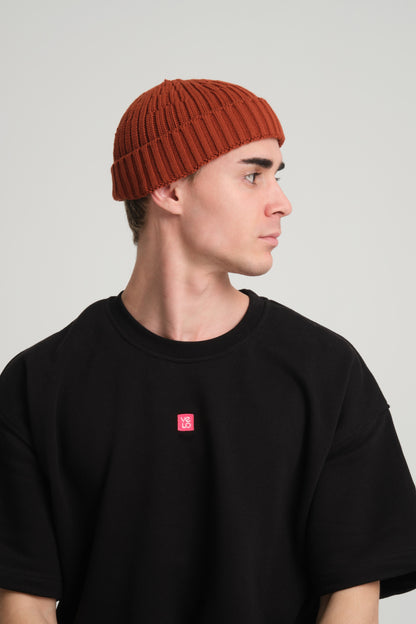 side view of a man wearing Brick Fisherman Beanie