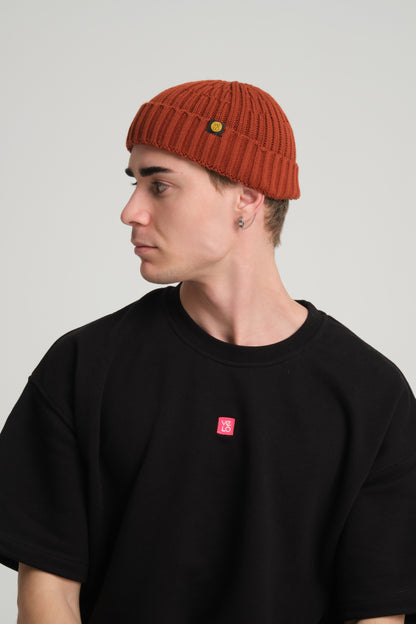 side view of a man wearing Brick Fisherman Beanie
