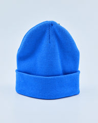 Bright blue beanie on a light gray background