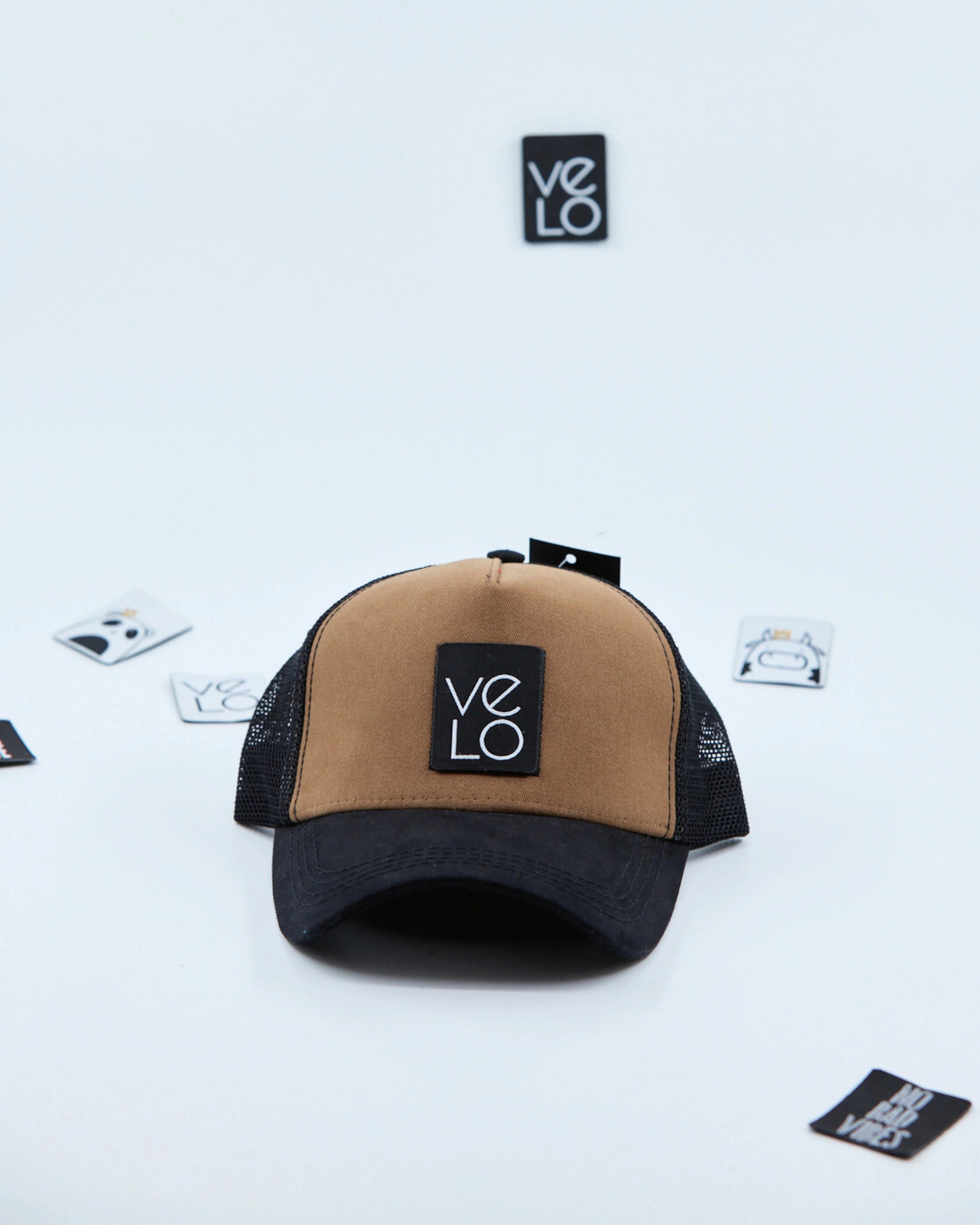Front view of Brown and Black Customisable Trucker Cap