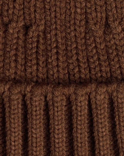 close detail of brown fisherman beanie