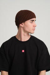 side view of a man wearing Brown Fisherman Beanie