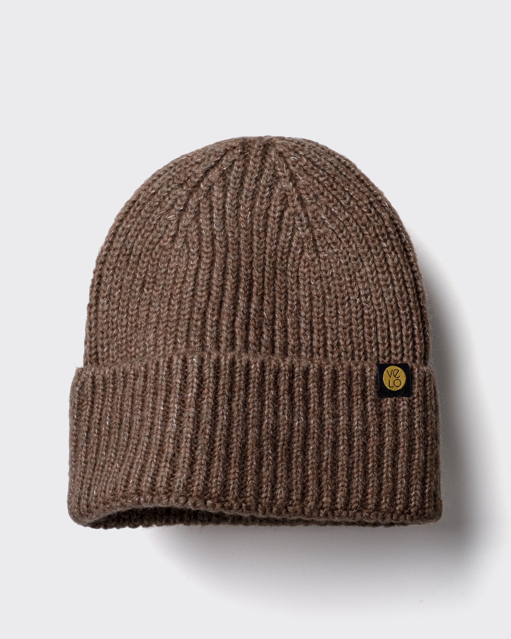 Brown Lux Beanie on a light gray background