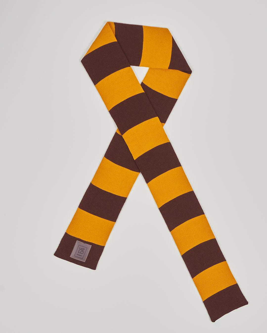 Brown & Amber unisex acrylic scarf flat lay in deep brown and golden amber