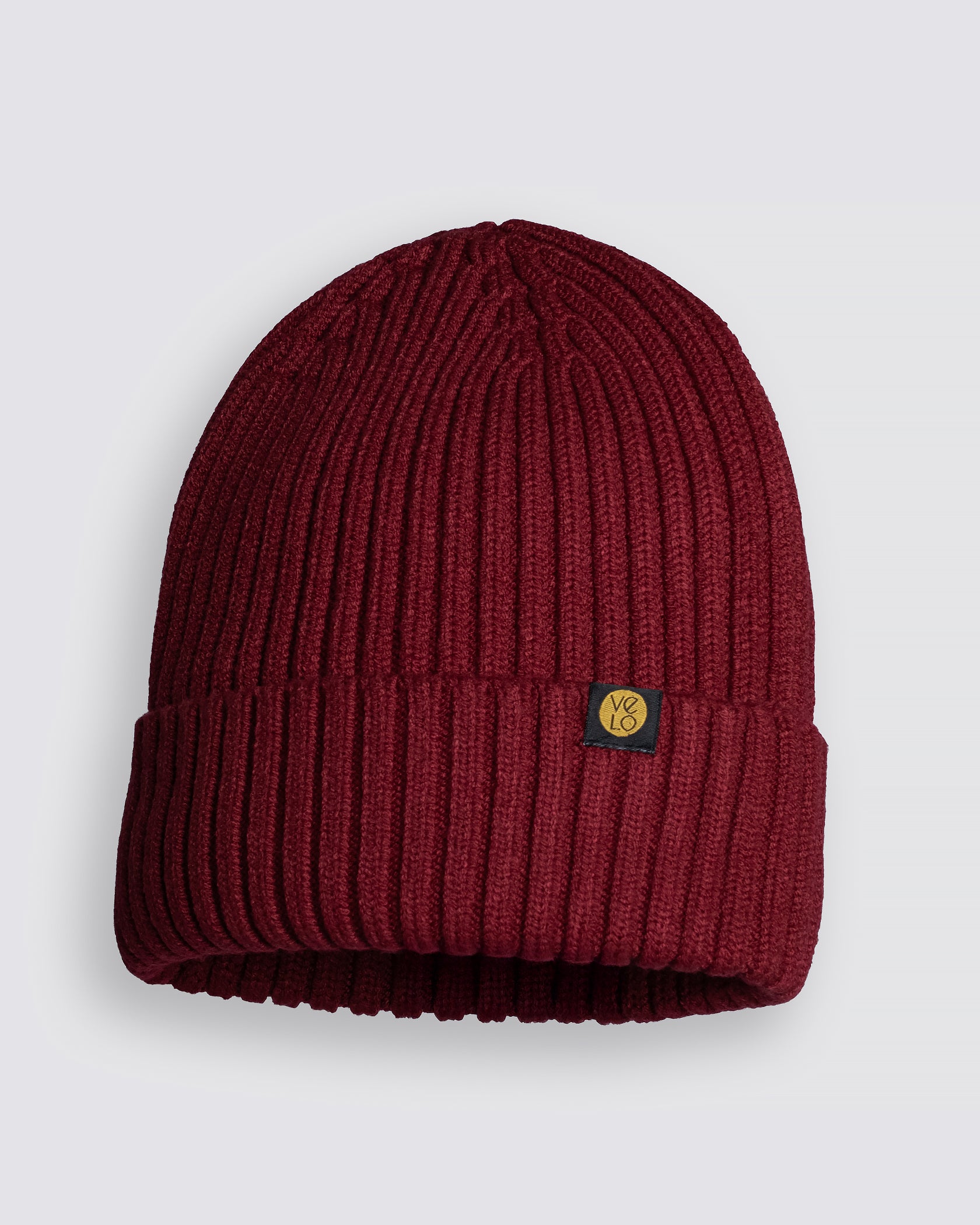 Burgundy Classic Beanie with a logo on a light gray background
