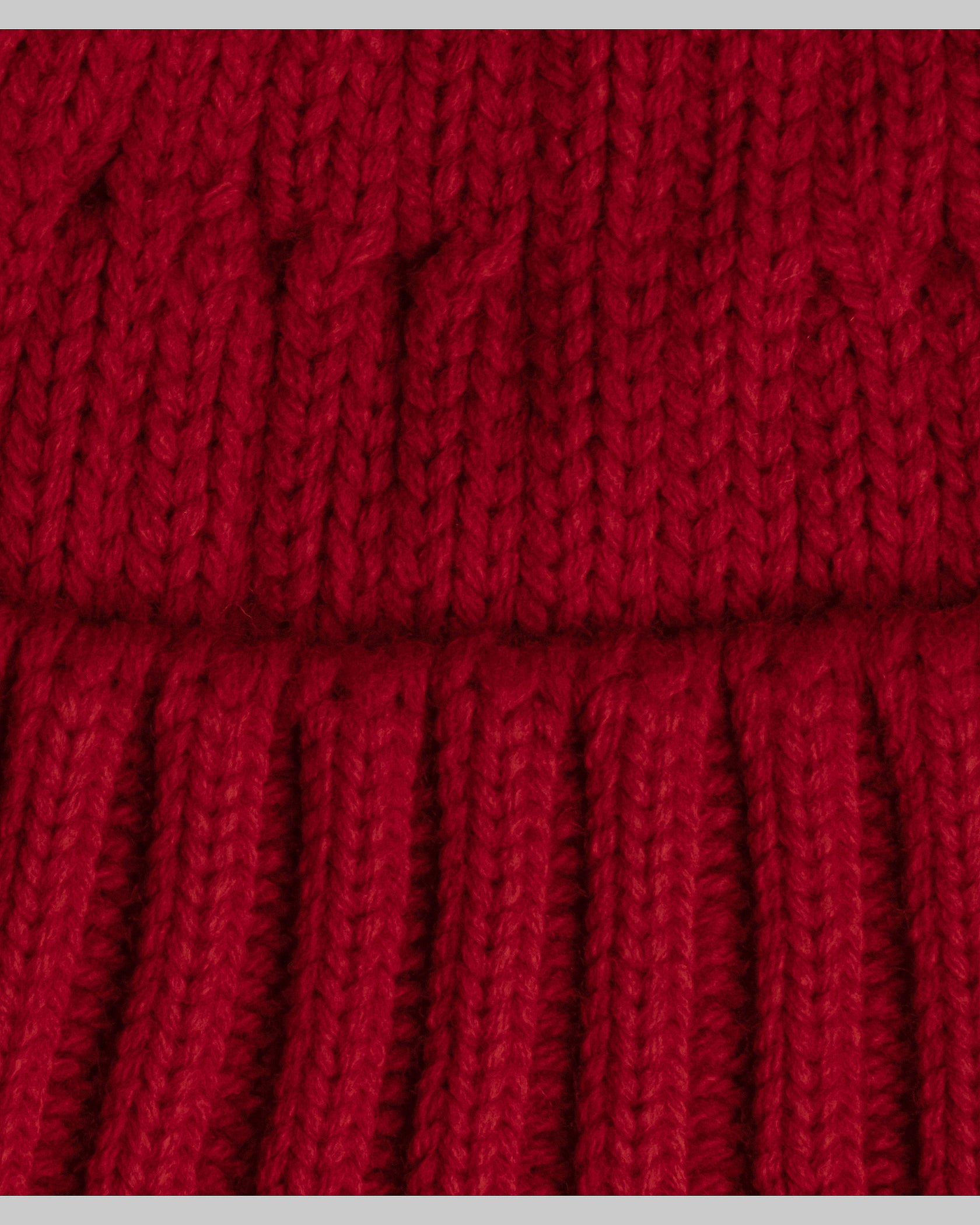 close look of burgundy fisherman beanie