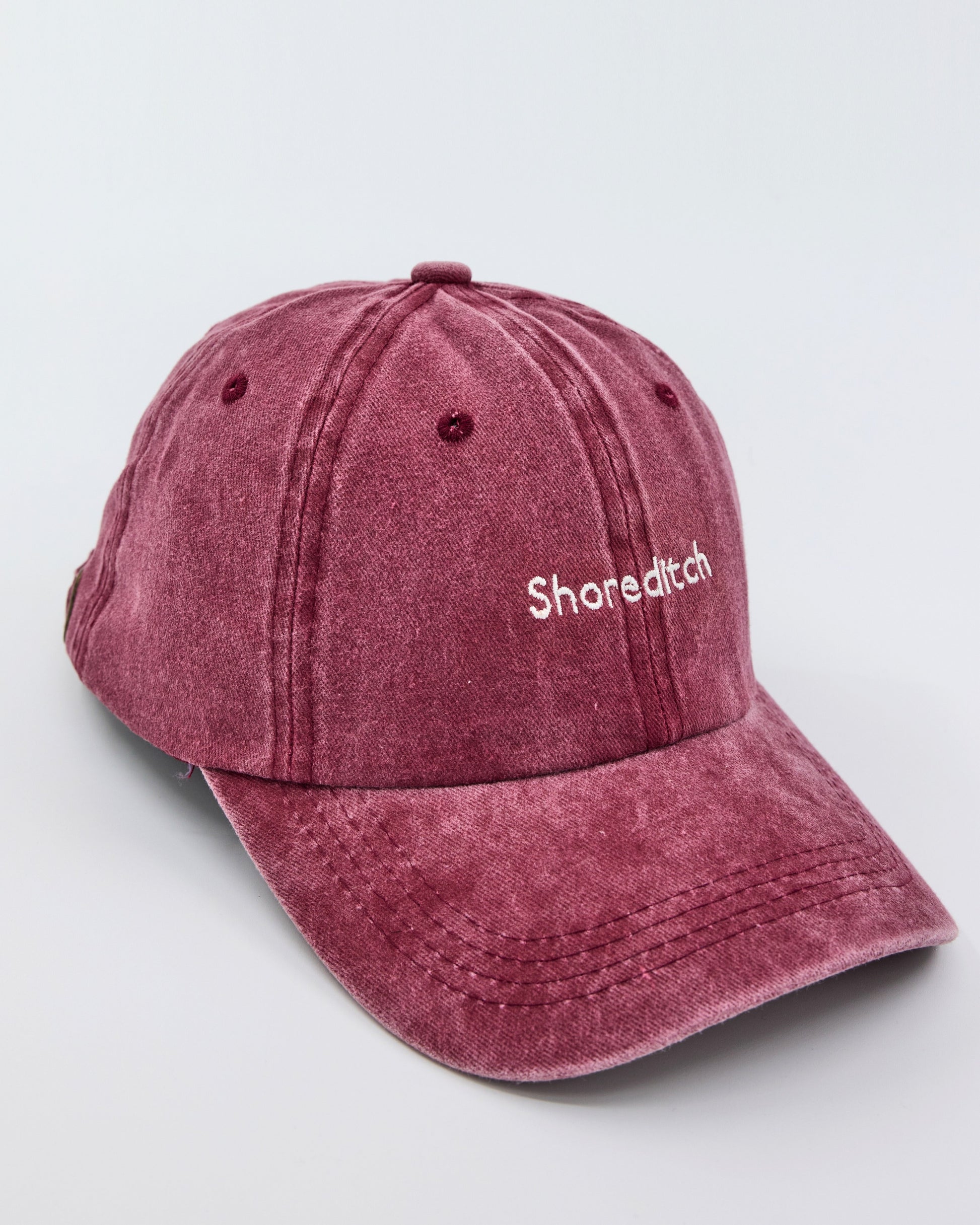 side view of Shoreditch Burgundy Washed Cap