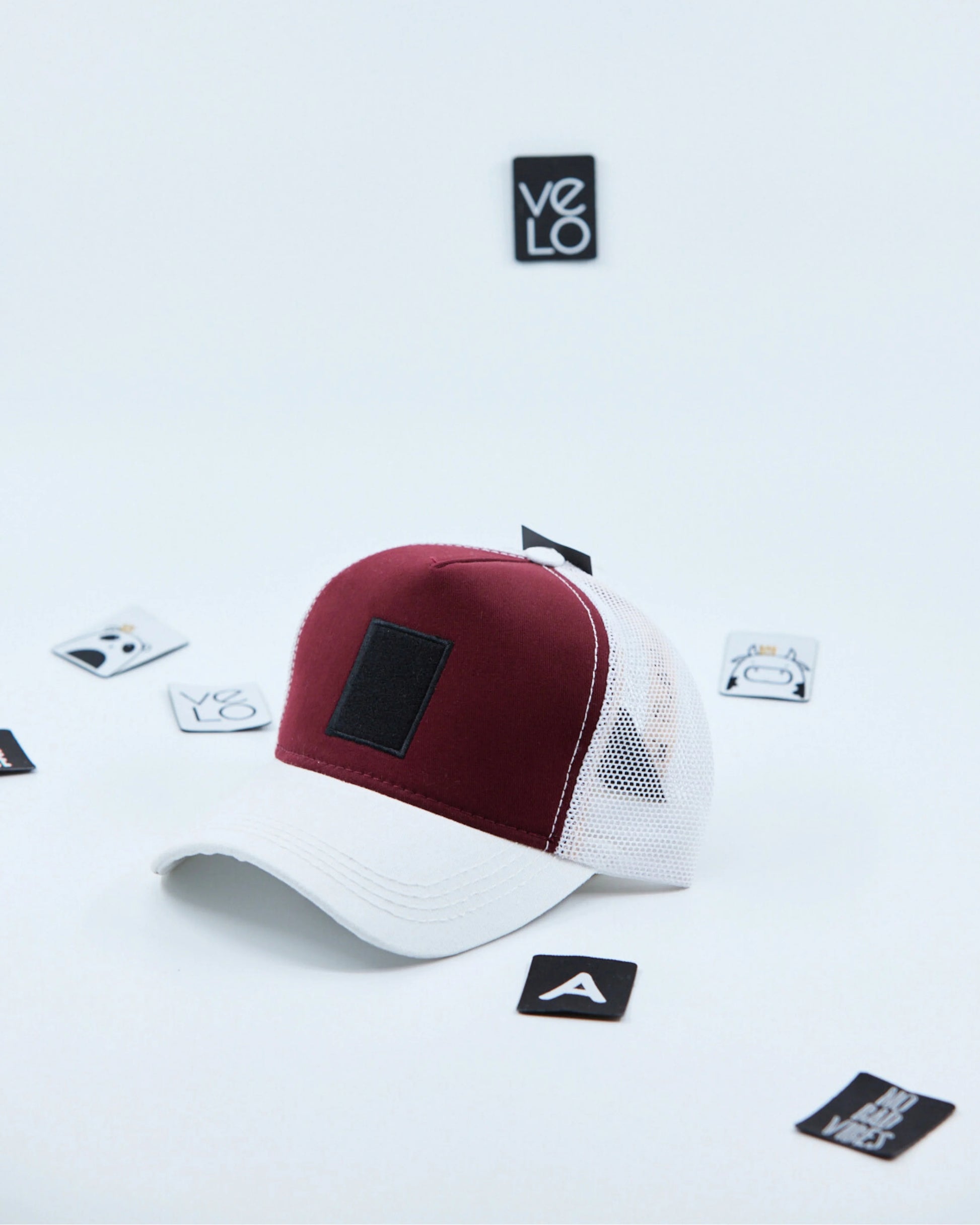 Side view of Burgundy and White Customisable Trucker Cap