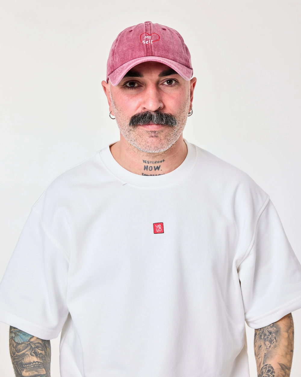 man wearing Love Myself Burgundy Washed Cap