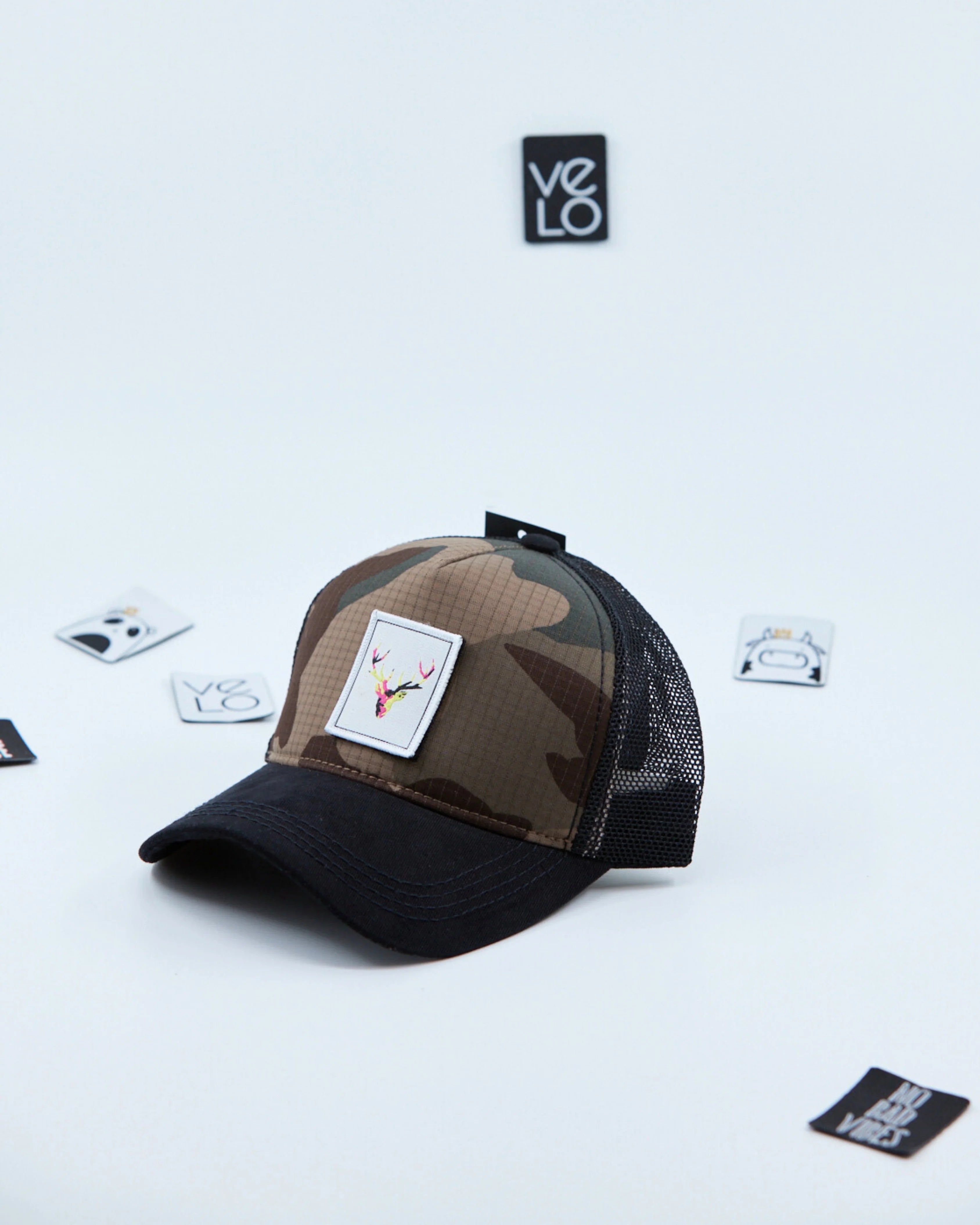 Side view of Brown Camo and Black Customisable Trucker Cap with patches
