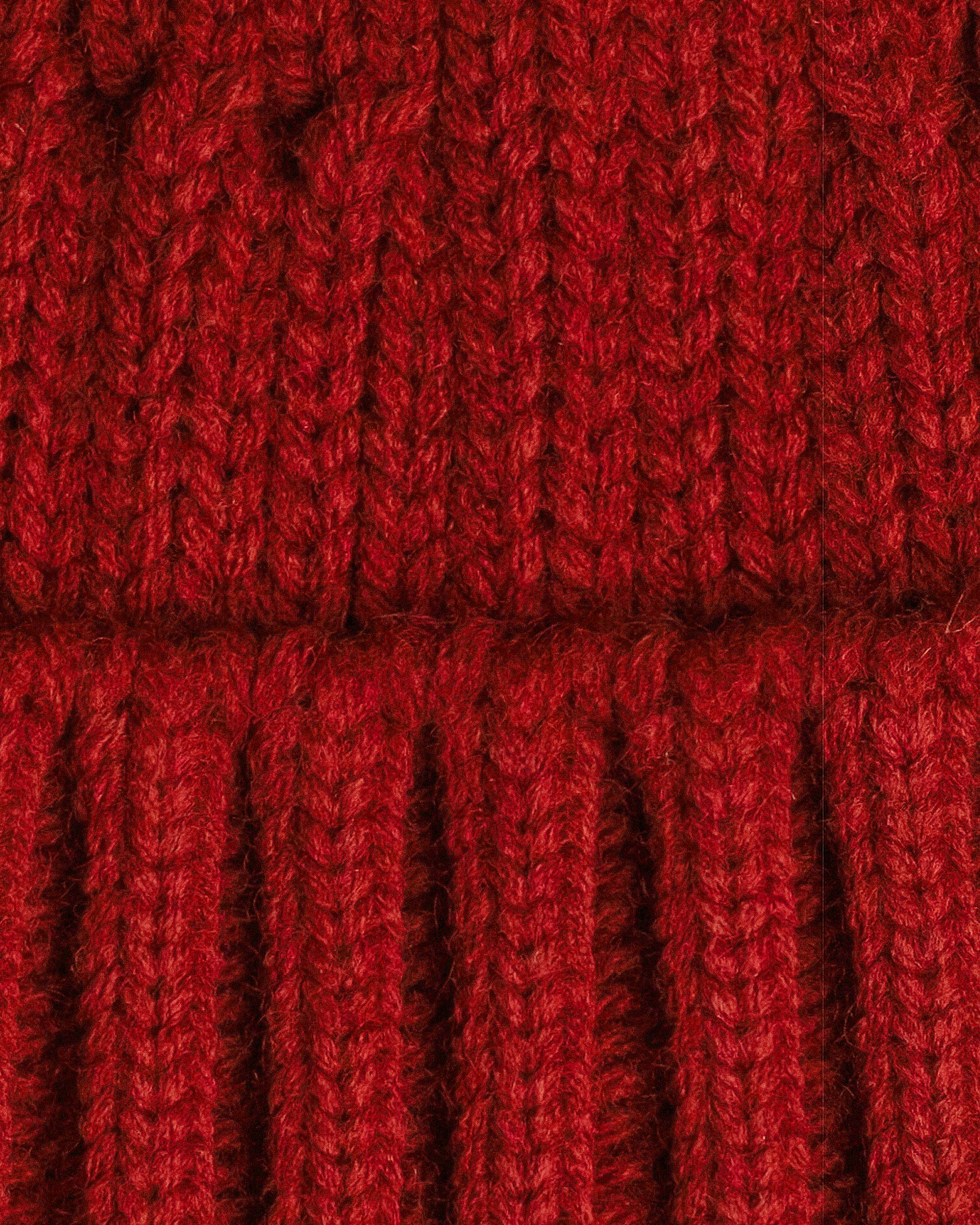 close look of chill red fisherman beanie