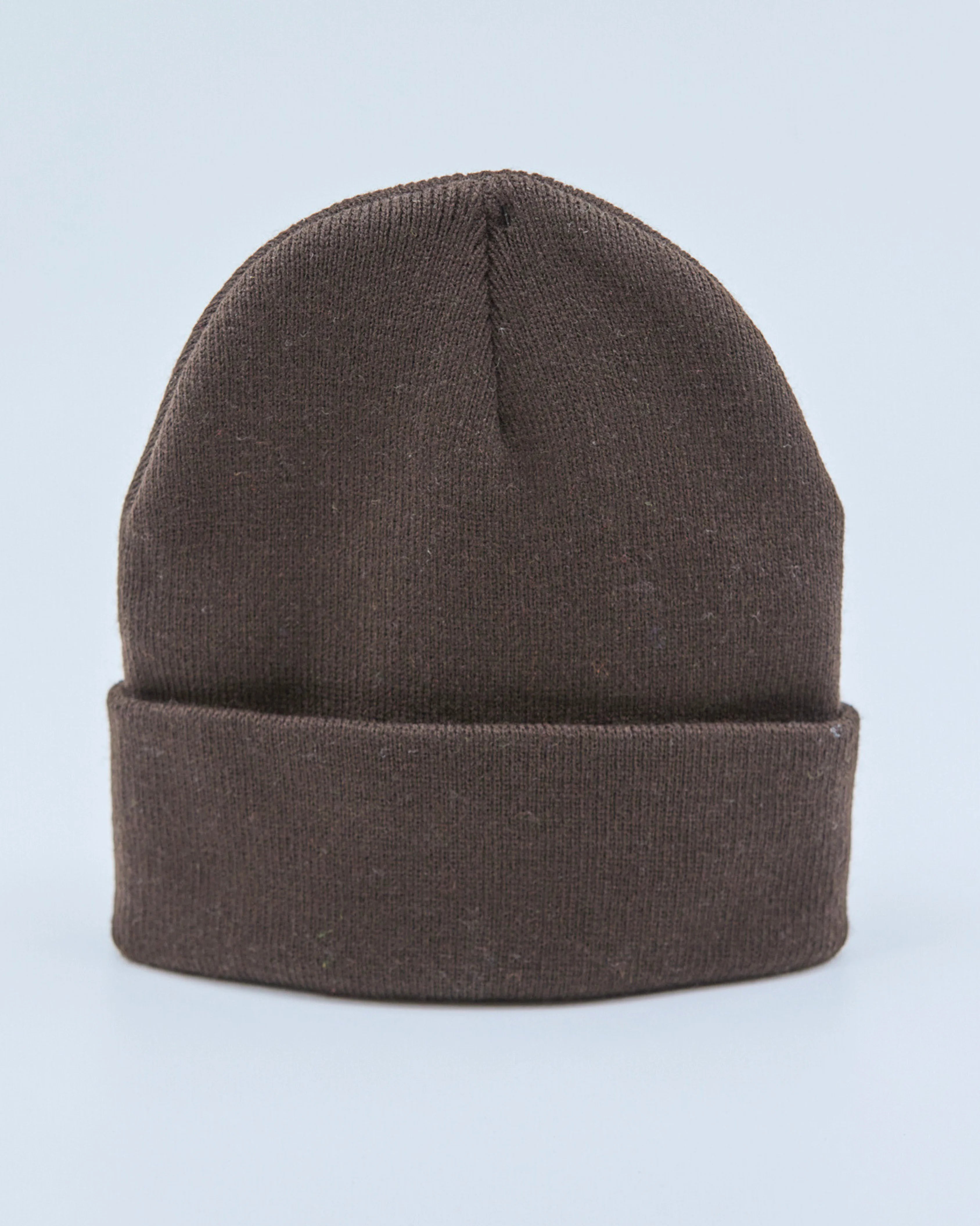 Chocolate beanie on a light blue background