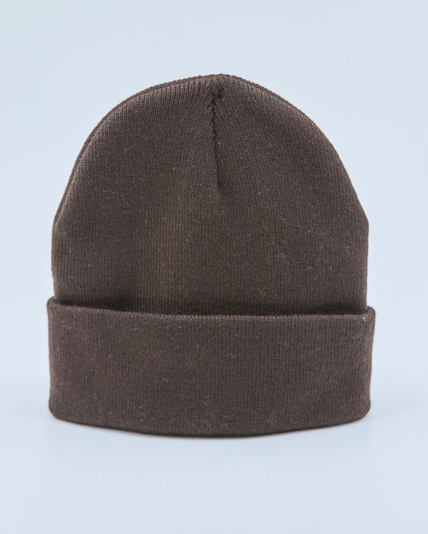 Chocolate beanie on a light blue background