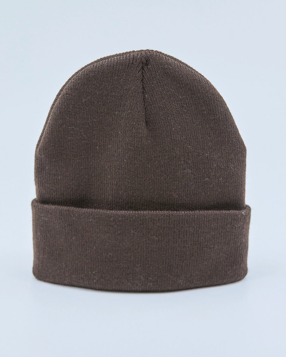 Chocolate beanie on a light blue background
