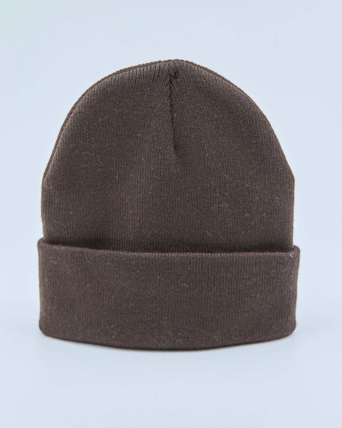 Chocolate beanie on a light blue background