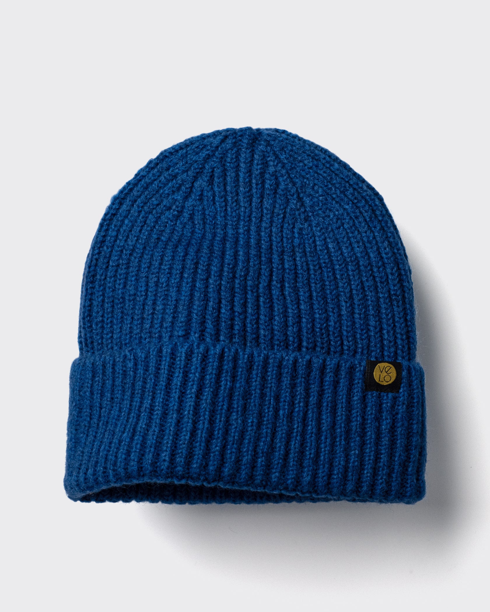 Cobalt Blue Lux Beanie on a light gray background