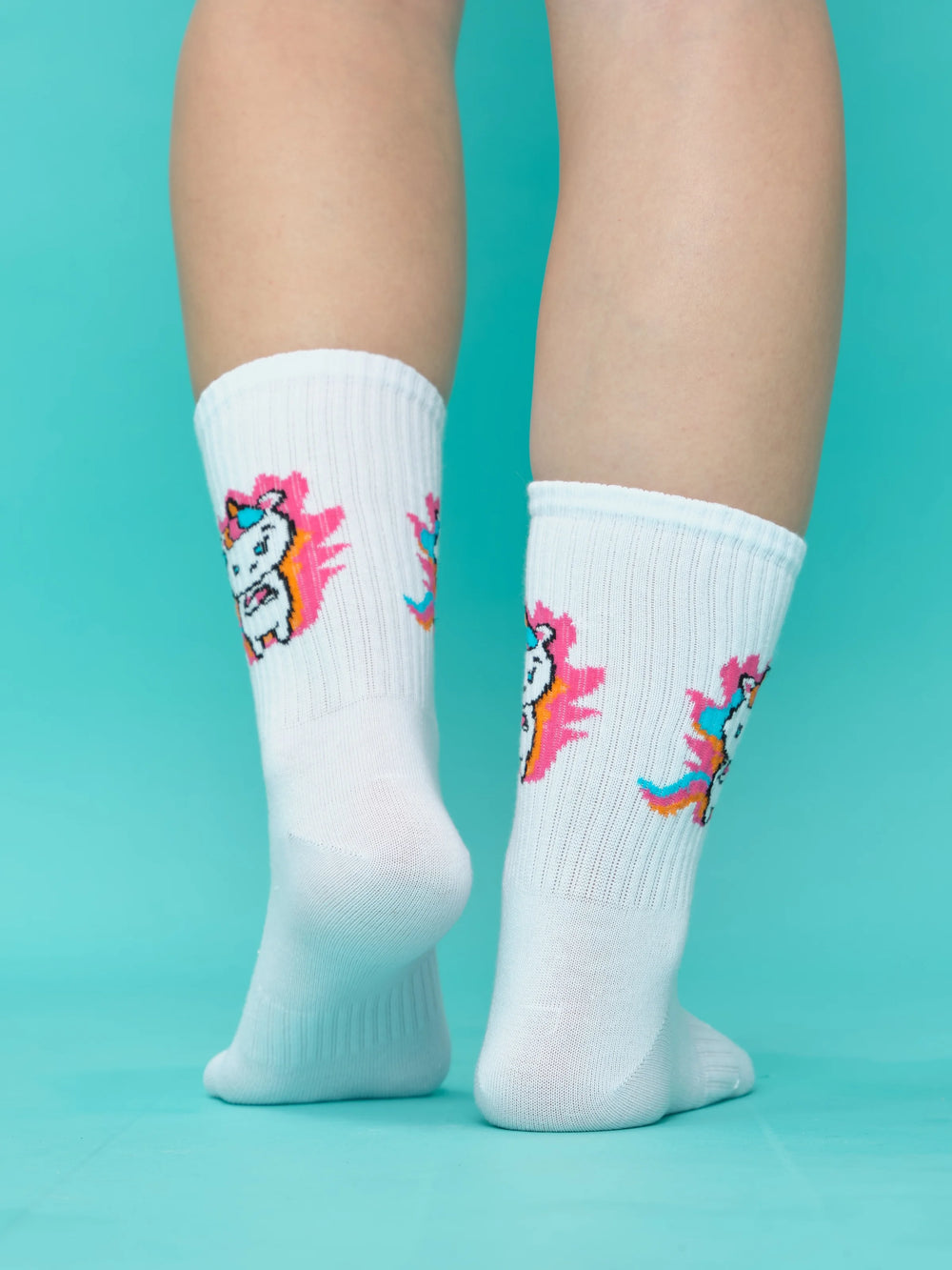 back view of colourful unicorn white socks