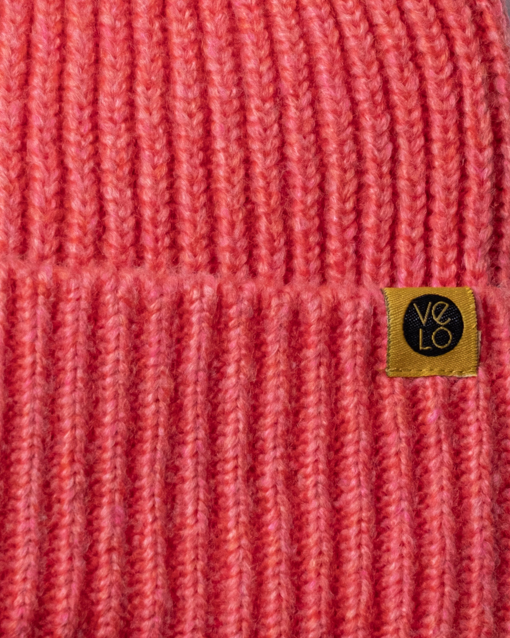 Close view of Coral Lux Beanie