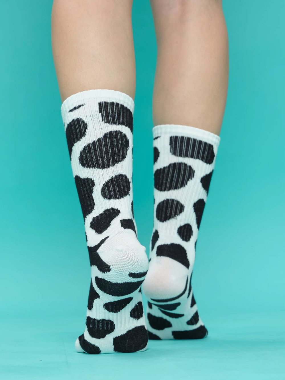 back view of cow socks