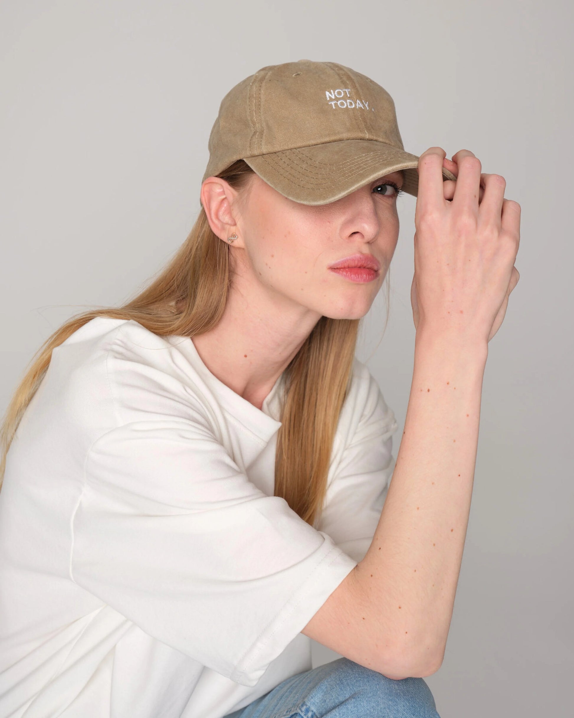 woman wearing Not Today Cream Washed Cap
