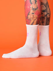 side view of pink crown white socks