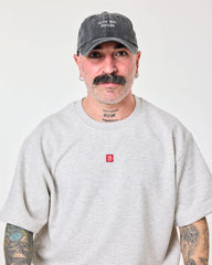 man wearing Cute But Psycho Black Washed Cap