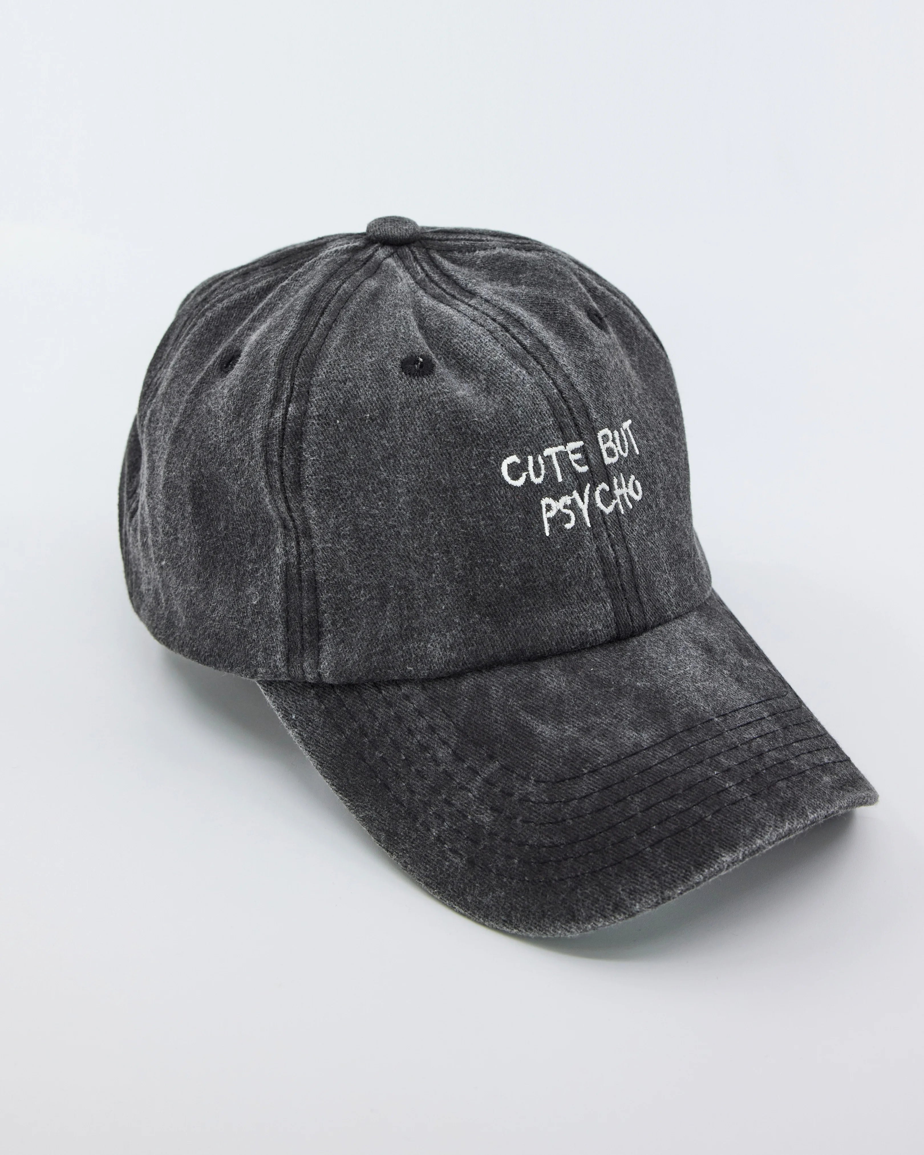 side view of Cute But Psycho Black Washed Cap