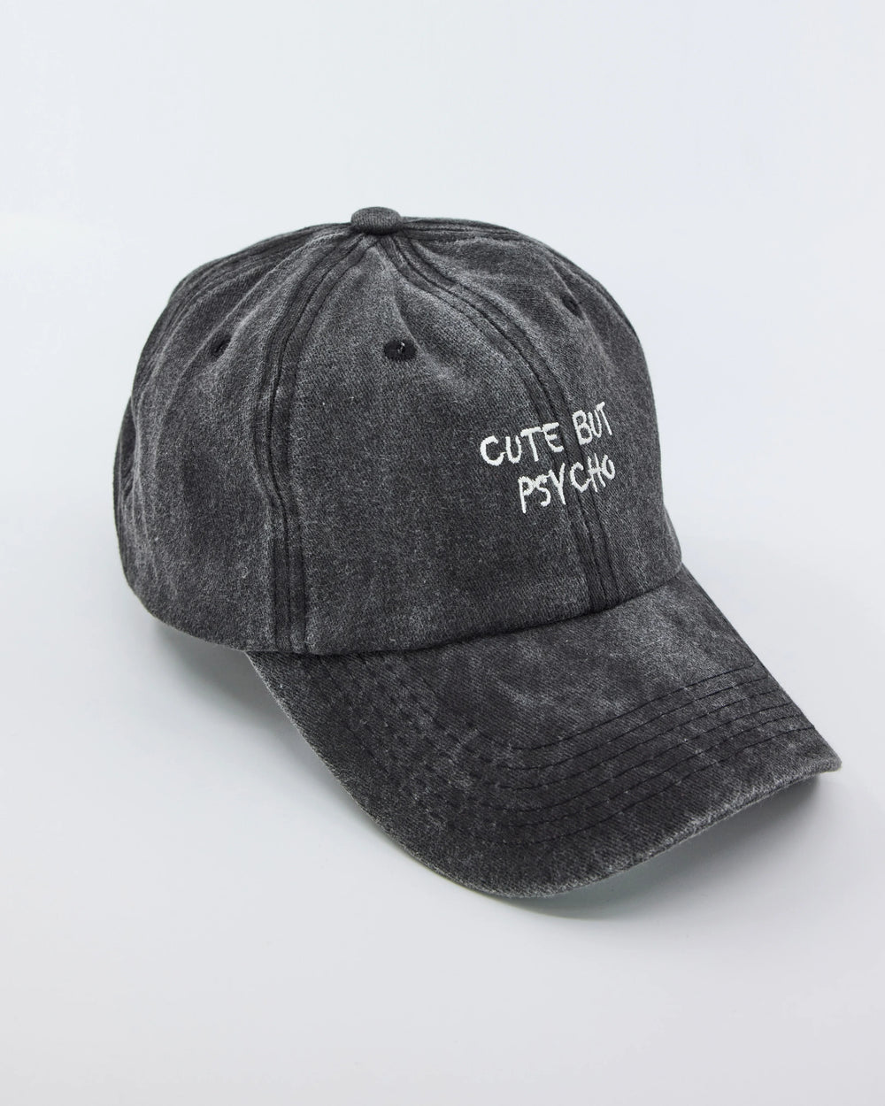 side view of Cute But Psycho Black Washed Cap
