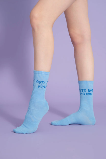side view of blue cute but psycho socks