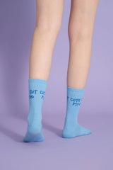 back view of blue cute but psycho socks