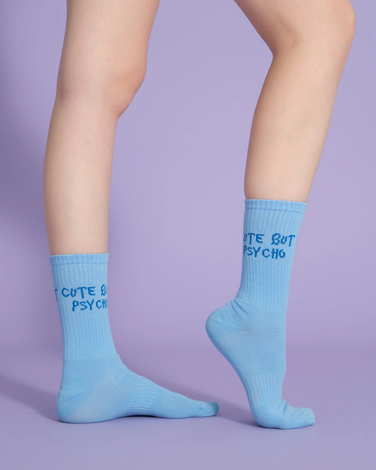 side view of blue cute but psycho socks