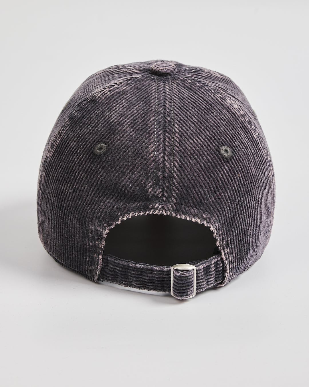 Back view of a charcoal grey cap on a light gray background
