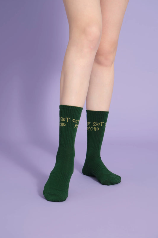 front view of green cute but psycho socks