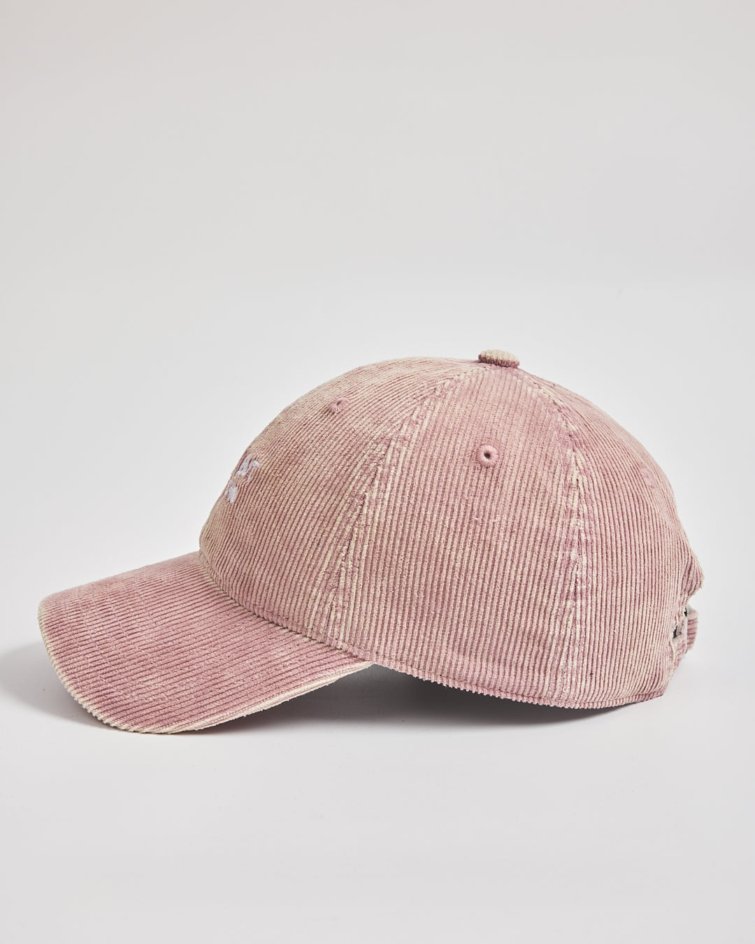 Pink corduroy cap on a light gray background