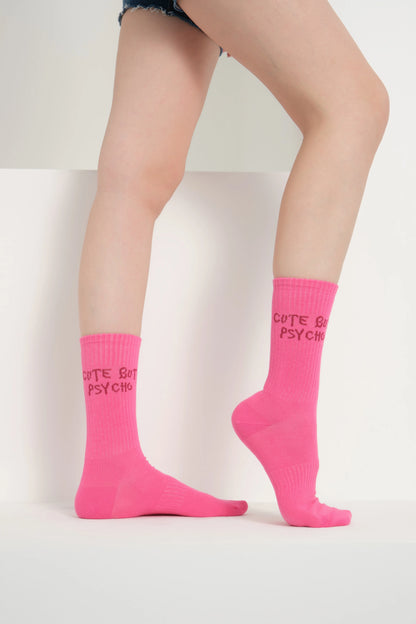 side view of a hot pink cute but psycho socks
