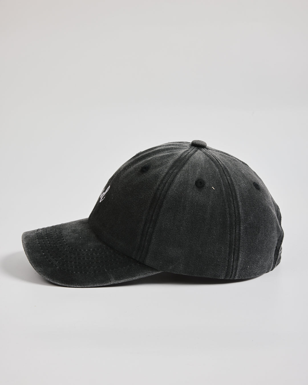 Dad Black Washed Caps on a light gray background